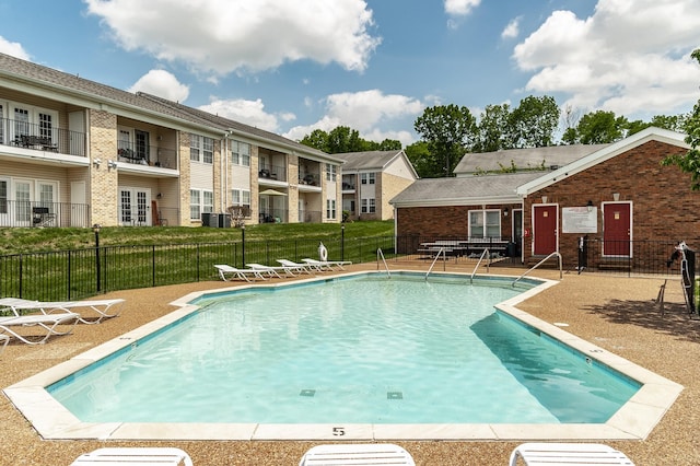 903 Churchill Xing, Madison, TN 37115 - community pool featuring french doors, a patio, and fence