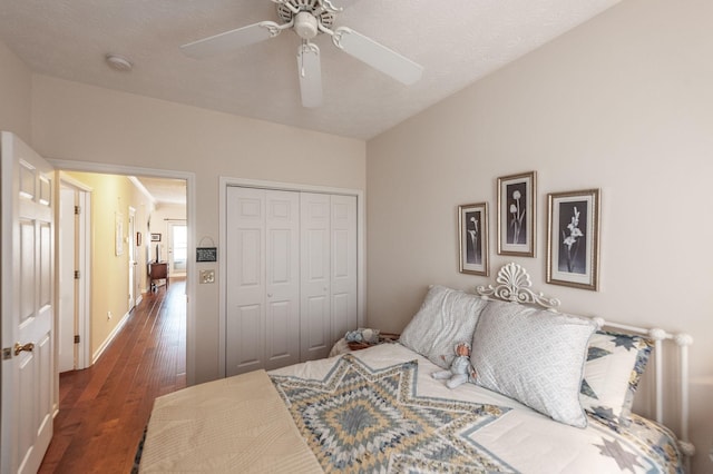 903 Churchill Xing, Madison, TN 37115 - bedroom featuring dark wood finished floors, a ceiling fan, a closet, and baseboards