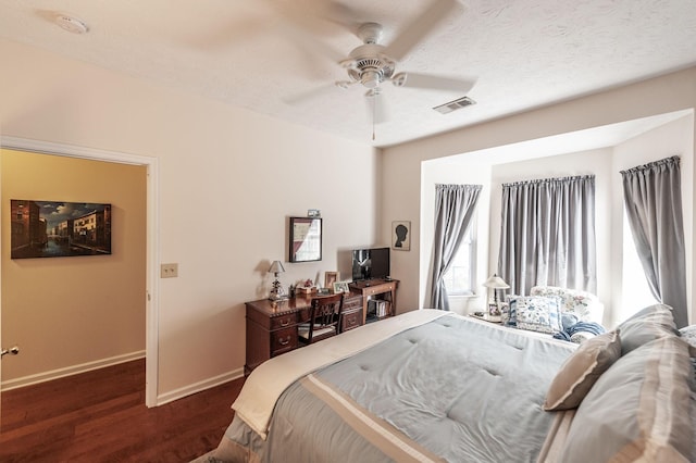 903 Churchill Xing, Madison, TN 37115 - bedroom featuring visible vents, baseboards, dark wood finished floors, a textured ceiling, and a ceiling fan