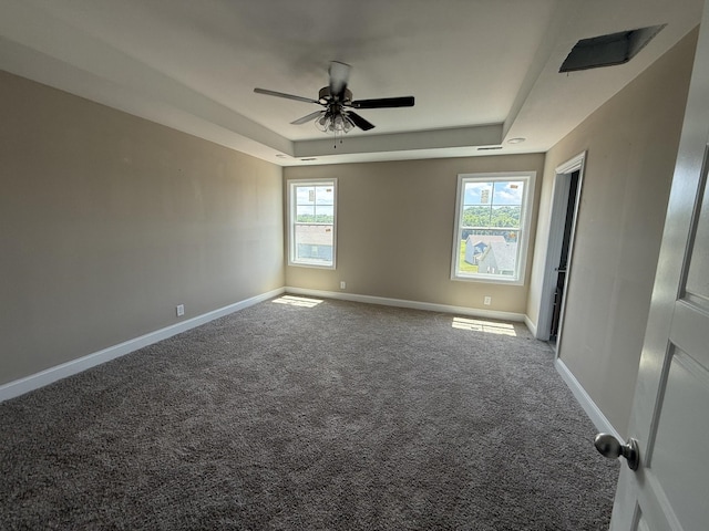 205 Cardinal Crk, Clarksville, TN 37040 - empty room with a raised ceiling, ceiling fan, baseboards, and carpet floors
