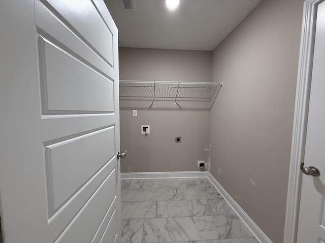 205 Cardinal Crk, Clarksville, TN 37040 - laundry area featuring hookup for an electric dryer, hookup for a washing machine, light marble finish floors, and baseboards