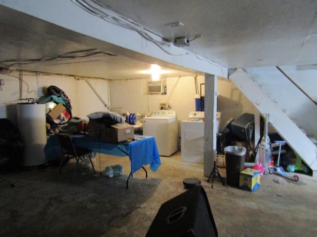 unfinished basement featuring separate washer and dryer and water heater