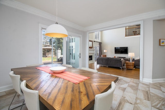5217 Apple Mill Ct, Brentwood, TN 37027 - dining space with ornamental molding, a fireplace, and baseboards