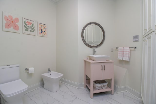 5217 Apple Mill Ct, Brentwood, TN 37027 - bathroom featuring marble finish floors, baseboards, vanity, a bidet, and toilet