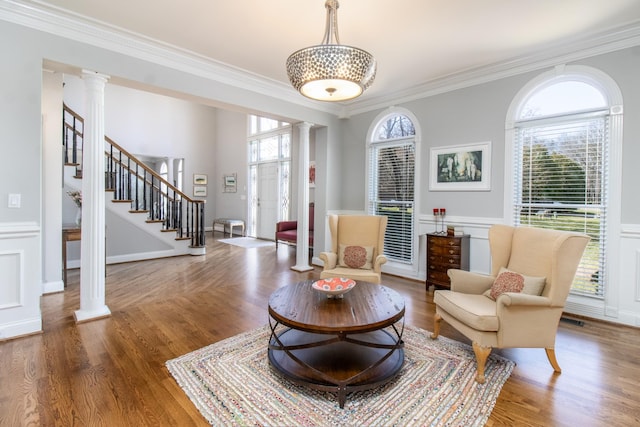 5217 Apple Mill Ct, Brentwood, TN 37027 - sitting room featuring ornate columns, ornamental molding, stairs, wood finished floors, and wainscoting