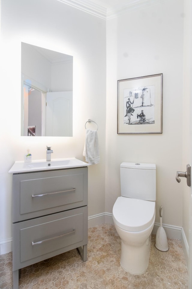 5217 Apple Mill Ct, Brentwood, TN 37027 - half bathroom featuring baseboards, vanity, toilet, and crown molding