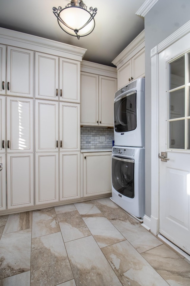 5217 Apple Mill Ct, Brentwood, TN 37027 - washroom with cabinet space and stacked washing machine and dryer