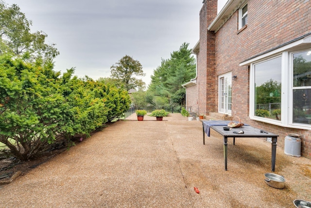 view of patio with fence