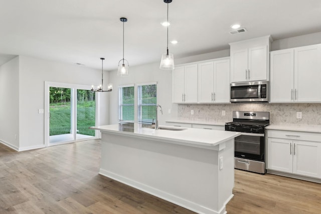 708 Brody Ct, Antioch, TN 37013 - kitchen with stainless steel appliances, tasteful backsplash, light wood finished floors, light countertops, and recessed lighting