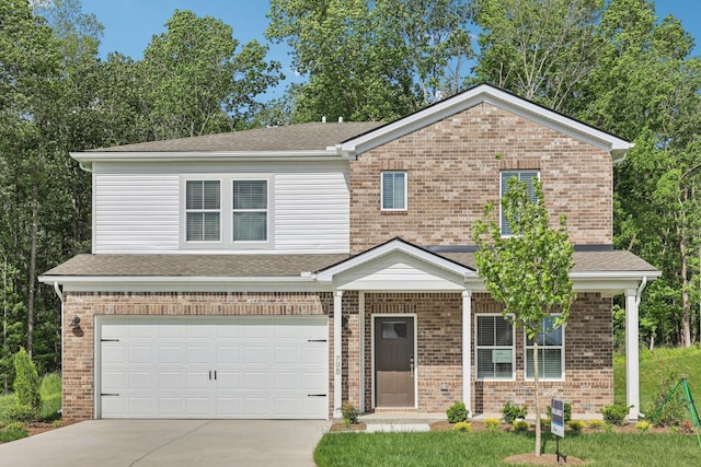 708 Brody Ct, Antioch, TN 37013 - view of front of property featuring an attached garage, driveway, brick siding, and a shingled roof