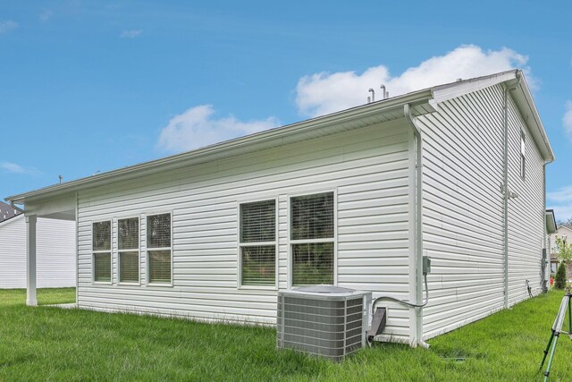 708 Brody Ct, Antioch, TN 37013 - view of side of home featuring a central air condition unit and a lawn