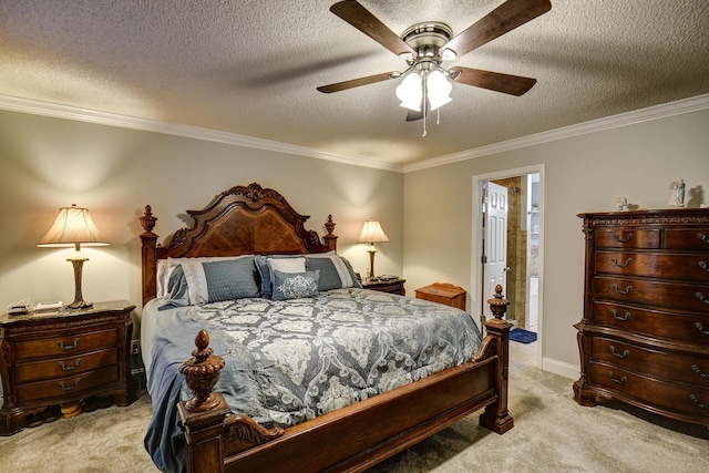 bedroom featuring ceiling fan, ornamental molding, ensuite bathroom, a textured ceiling, and light colored carpet
