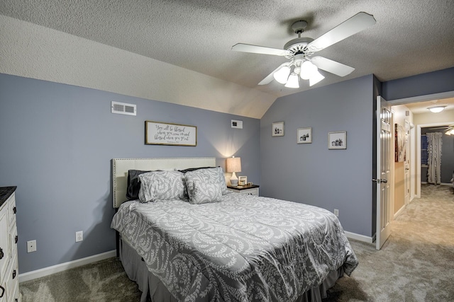 bedroom featuring light carpet, visible vents, baseboards, and vaulted ceiling