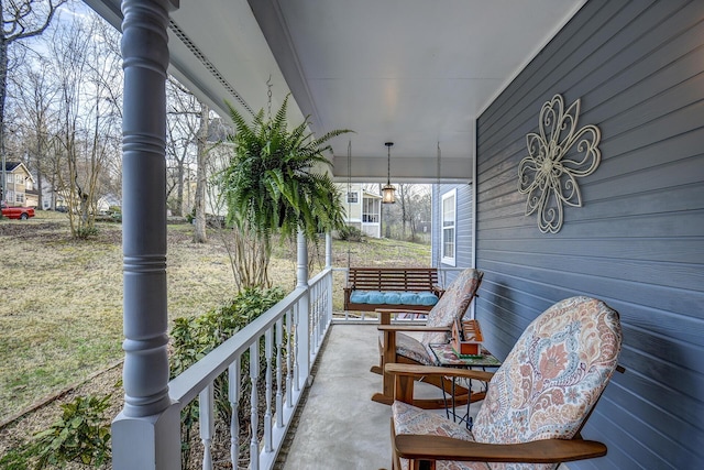 balcony featuring a porch
