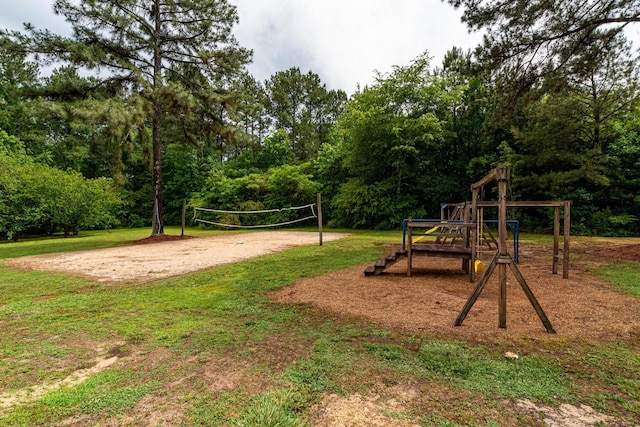 community jungle gym featuring volleyball court and a yard