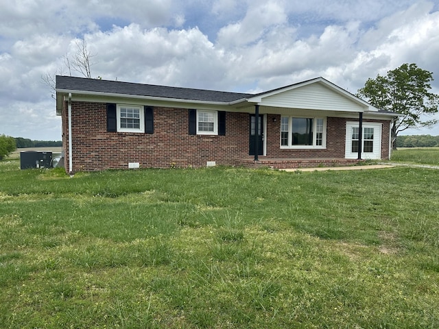 59 Overnack Rd, Lawrenceburg, TN 38464 - single story home with a front lawn and brick siding