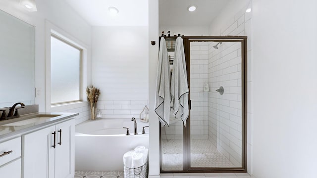 5020 E Mayflower Ct, Greenbrier, TN 37073 - bathroom featuring vanity, a shower stall, and a bath