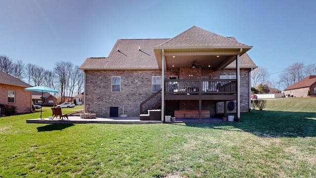 5020 E Mayflower Ct, Greenbrier, TN 37073 - rear view of house featuring a ceiling fan, a patio, an outdoor fire pit, a wooden deck, and brick siding