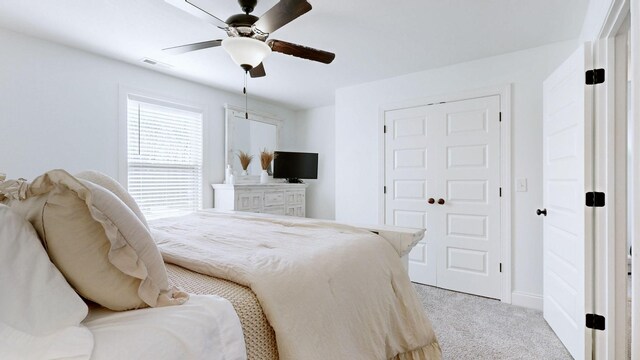 5020 E Mayflower Ct, Greenbrier, TN 37073 - bedroom featuring ceiling fan, visible vents, and light carpet