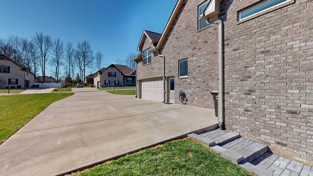 5020 E Mayflower Ct, Greenbrier, TN 37073 - view of sport court with a yard and a residential view