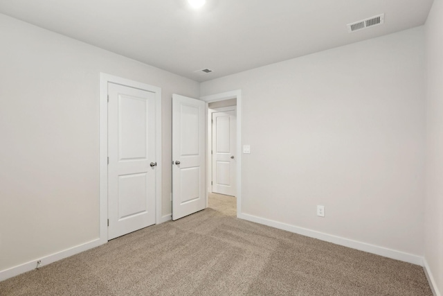 4228 Skyridge Dr, Nashville, TN 37207 - unfurnished bedroom with light colored carpet, visible vents, and baseboards