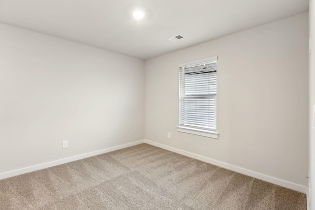 4228 Skyridge Dr, Nashville, TN 37207 - spare room featuring light carpet, baseboards, and visible vents