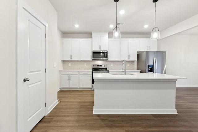 4228 Skyridge Dr, Nashville, TN 37207 - kitchen featuring a sink, stainless steel appliances, backsplash, white cabinets, and baseboards