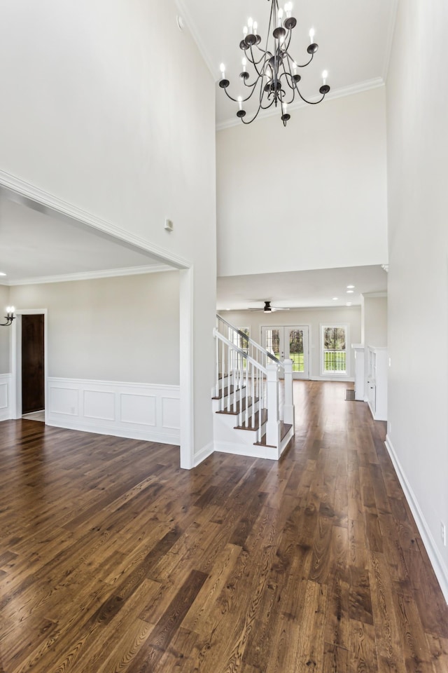 3725 Glen Raven Rd, Cedar Hill, TN 37032 - interior space featuring dark wood finished floors, stairway, ornamental molding, and a chandelier