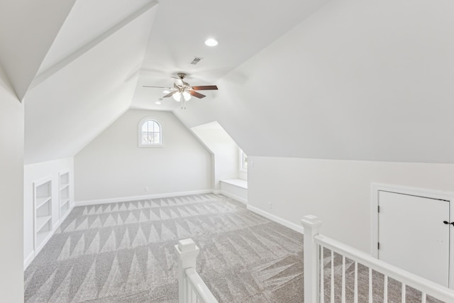 3725 Glen Raven Rd, Cedar Hill, TN 37032 - bonus room featuring built in features, baseboards, visible vents, vaulted ceiling, and carpet flooring