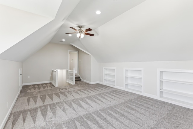 3725 Glen Raven Rd, Cedar Hill, TN 37032 - additional living space with lofted ceiling, built in features, carpet, and baseboards