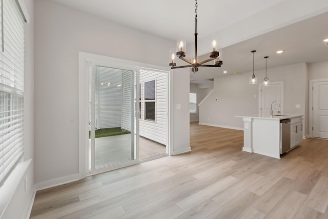 4220 Skyridge Dr, Nashville, TN 37207 - kitchen with a chandelier, dishwasher, a sink, light wood finished floors, and recessed lighting