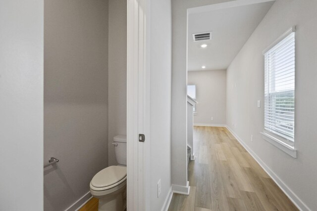 4220 Skyridge Dr, Nashville, TN 37207 - bathroom featuring toilet, wood finished floors, baseboards, and recessed lighting