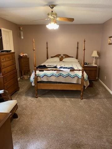 1306 Mcmahan St, Manchester, TN 37355 - carpeted bedroom with a ceiling fan and baseboards