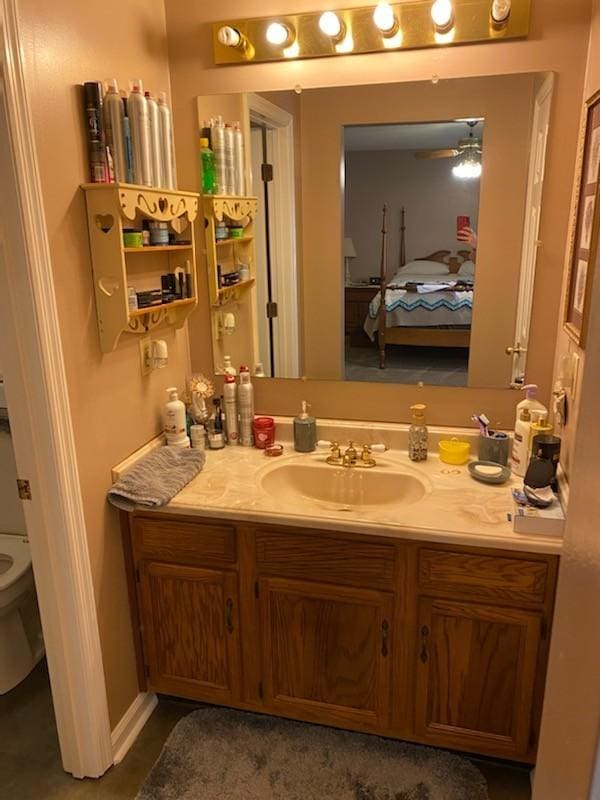 1306 Mcmahan St, Manchester, TN 37355 - ensuite bathroom featuring vanity and ceiling fan