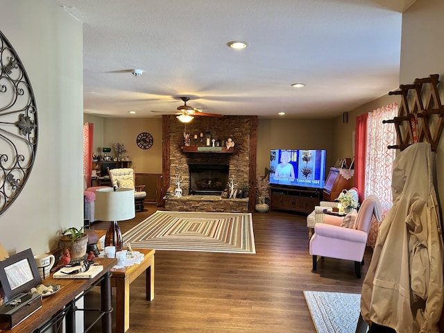 1306 Mcmahan St, Manchester, TN 37355 - living area with ceiling fan, wood finished floors, a stone fireplace, and recessed lighting