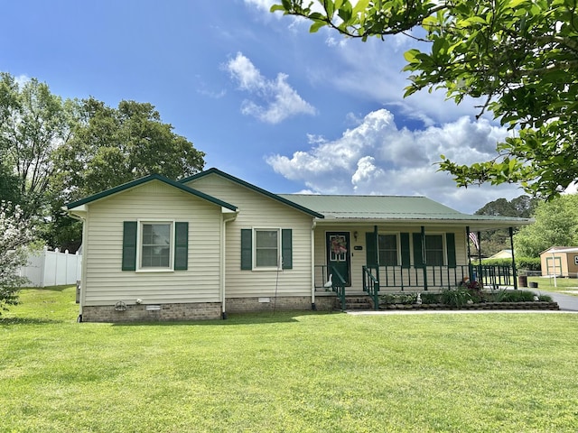 1306 Mcmahan St, Manchester, TN 37355 - view of front of property with covered porch, crawl space, and metal roof