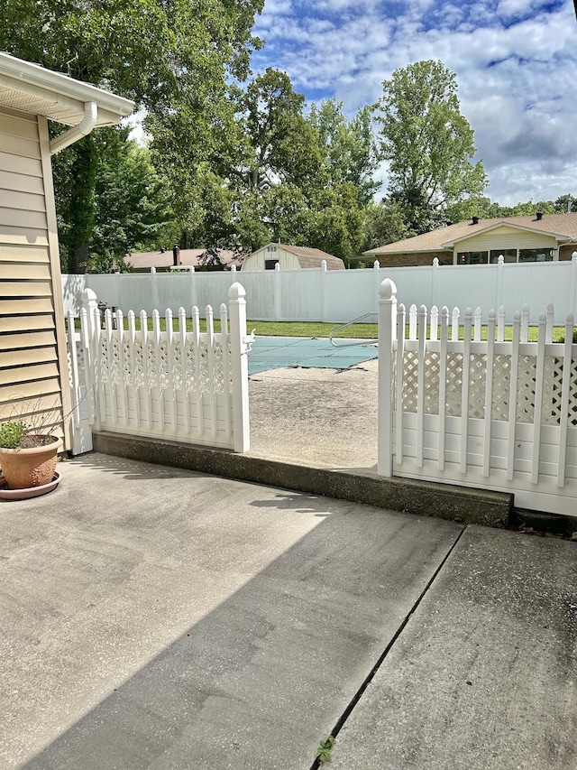 1306 Mcmahan St, Manchester, TN 37355 - gate with a patio and a fenced backyard