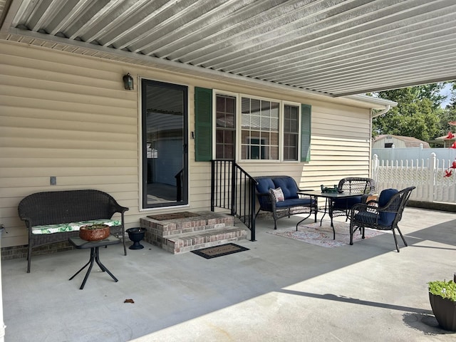1306 Mcmahan St, Manchester, TN 37355 - view of patio featuring fence and an outdoor hangout area