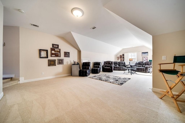 908 Plantation Blvd, Gallatin, TN 37066 - carpeted living area with vaulted ceiling, baseboards, and visible vents