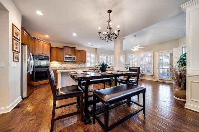 908 Plantation Blvd, Gallatin, TN 37066 - dining space featuring visible vents, dark wood-type flooring, baseboards, recessed lighting, and ceiling fan with notable chandelier