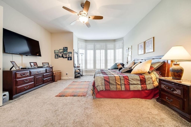 908 Plantation Blvd, Gallatin, TN 37066 - bedroom with baseboards, light carpet, and a ceiling fan