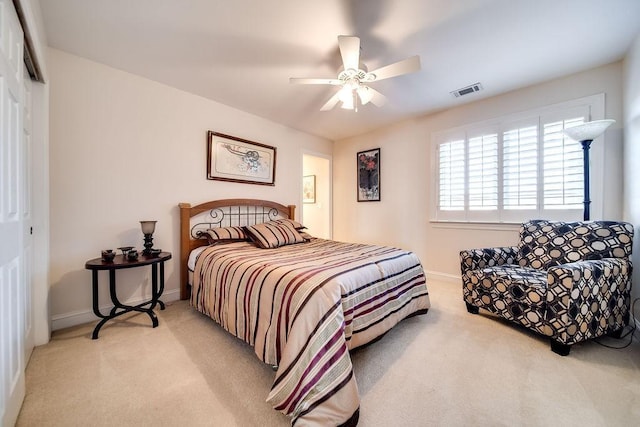 908 Plantation Blvd, Gallatin, TN 37066 - bedroom with a ceiling fan, baseboards, visible vents, a closet, and light carpet