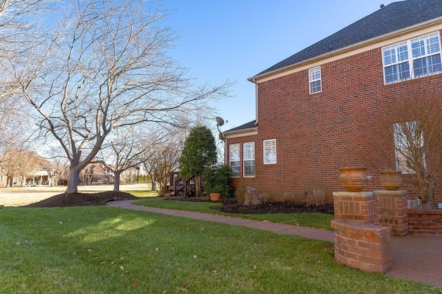 908 Plantation Blvd, Gallatin, TN 37066 - view of property exterior with brick siding and a yard