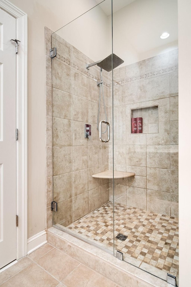 908 Plantation Blvd, Gallatin, TN 37066 - full bathroom featuring tile patterned floors and a stall shower
