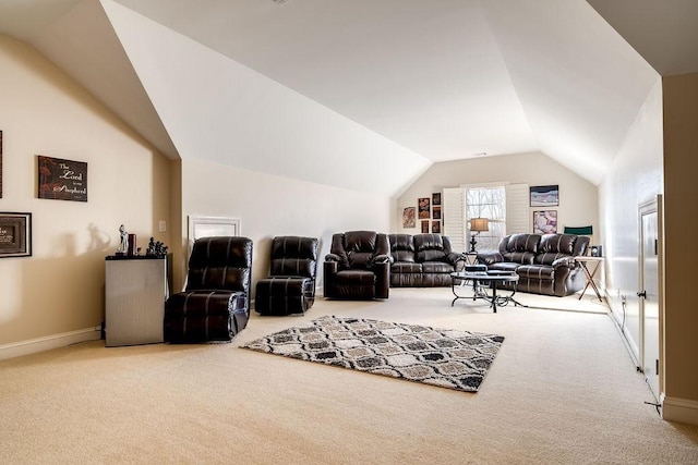908 Plantation Blvd, Gallatin, TN 37066 - carpeted living area with vaulted ceiling and baseboards