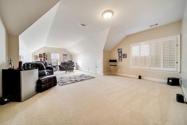 908 Plantation Blvd, Gallatin, TN 37066 - carpeted living area with visible vents, baseboards, and vaulted ceiling
