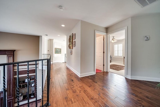 908 Plantation Blvd, Gallatin, TN 37066 - hall with hardwood / wood-style floors, visible vents, baseboards, recessed lighting, and an upstairs landing