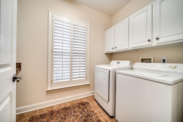 908 Plantation Blvd, Gallatin, TN 37066 - clothes washing area featuring washer and dryer, light tile patterned floors, cabinet space, and baseboards