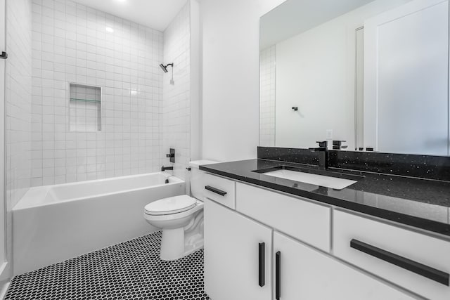 full bathroom featuring vanity, shower / bathing tub combination, and toilet