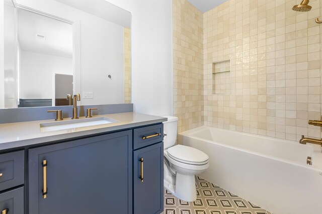 full bathroom with vanity,  shower combination, toilet, and visible vents